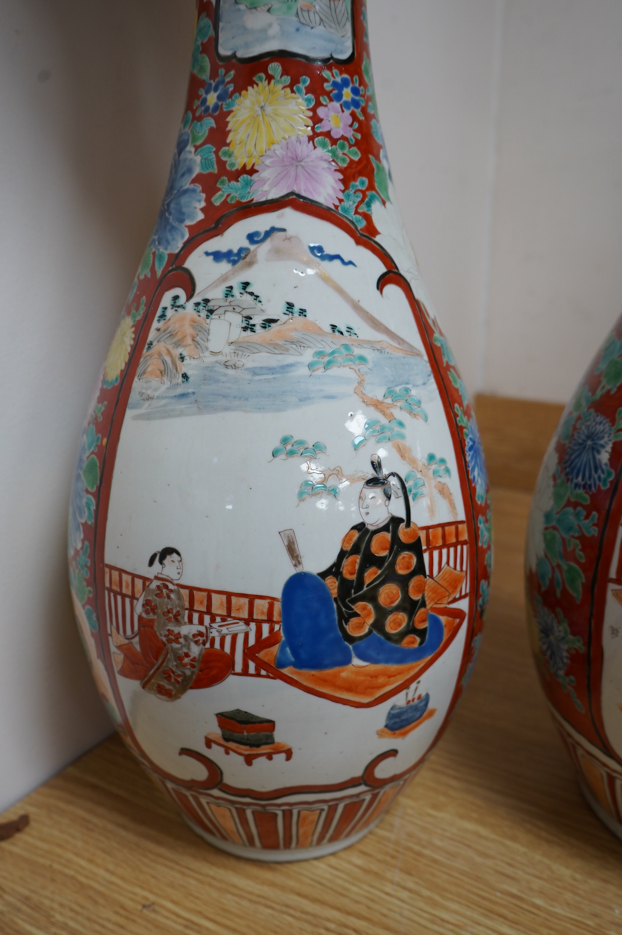 A pair of Japanese Kutani vases, Meiji period, 55.5cm. Condition - poor